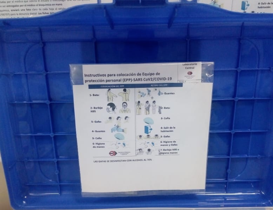 Working standards stuck to the inside of the lid of Covid testing kit