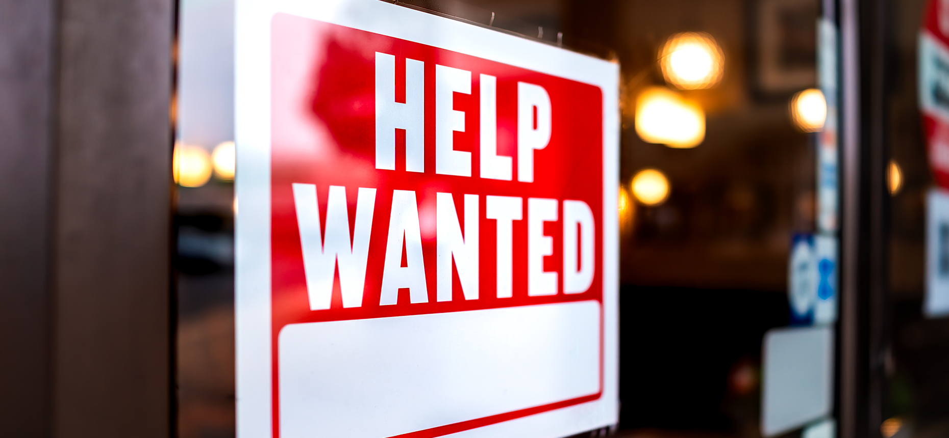 Help Wanted sign in window