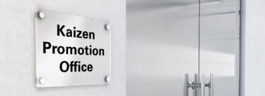 office sign that says - Kaizen Promotion Office