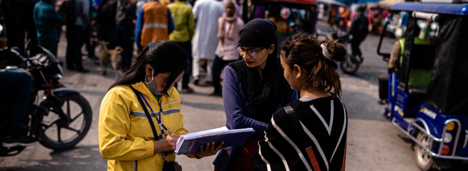 Women in Nepal in group talking in public